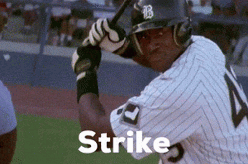 Baseball Player Swinging Bat Strike