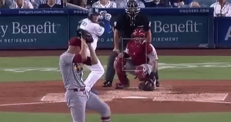 Baseball Player Swinging Bat With Catcher