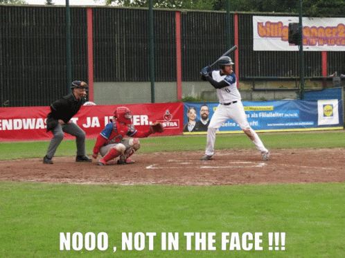 Baseball Player Swinging Not in the Face