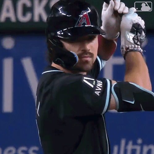 Baseball Player Swinging with Letter A on Helmet