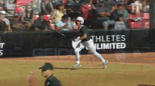 Baseball Player Swings Bat Before Athletes Unlimited Ad
