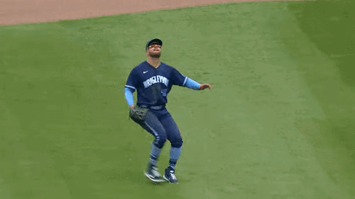 Baseball Player Throwing Ball