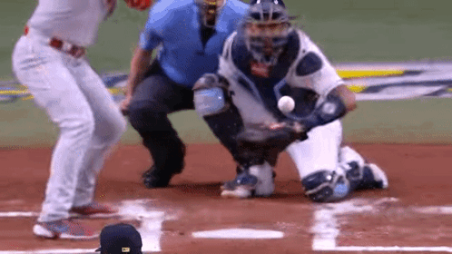 Baseball Player Trying to Catch Ball