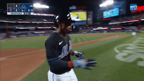 Baseball Player Walking on Field
