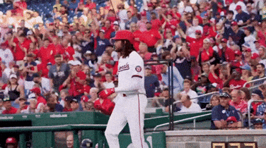 Baseball Player Walking to Dugout