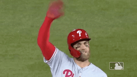 Baseball Player Waving Helmet