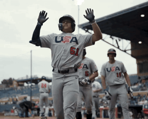 Baseball Player Waving USA Jersey