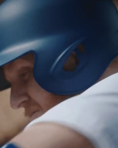 Baseball Player Wearing Blue Helmet