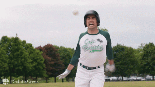 Baseball Player Wearing Cafe Tropical Shirt