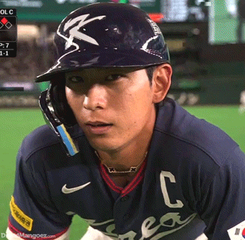Baseball Player Wearing K Helmet