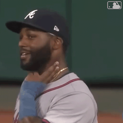 Baseball Player With Beard Smiling Holding Baby GIF