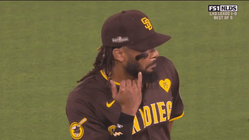 Baseball Player With Hat and Otis Jr. Shirt