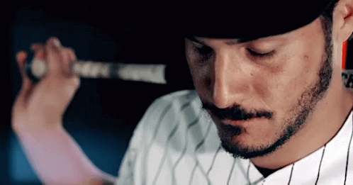 Baseball Player With Neck Tattoo Saying Ch