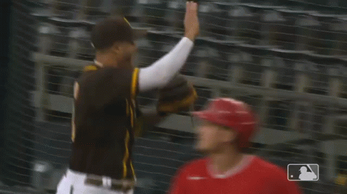 Baseball Players Giving High Five GIF