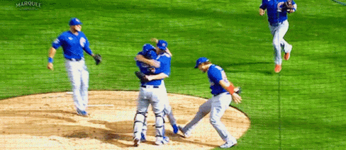 Baseball Players Hugging on Field