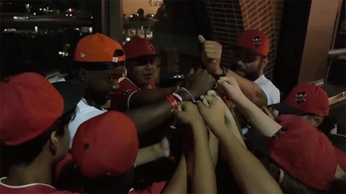 Baseball Players in Red Hats With Ros
