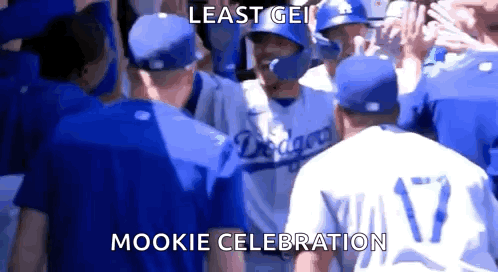 Baseball Players Standing in Crowd