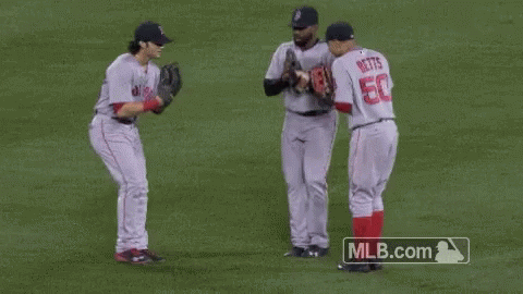 Baseball Players Standing On Field GIF