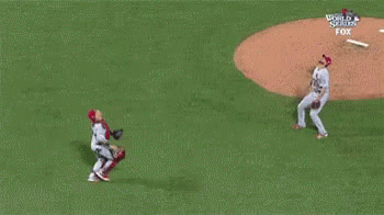 Baseball Players Standing on Field