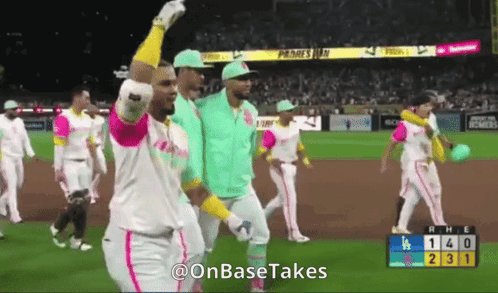 Baseball Players Walking on Field