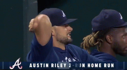 Baseball Players Watching Braves Nationals