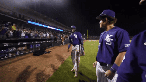 Baseball Players Wearing Purple Uniforms With Ks On The Front GIF