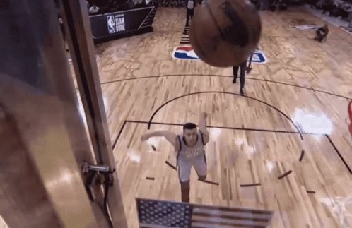 Basketball Dunked on Court With NBA Logo