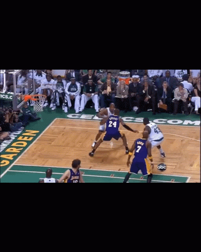 Basketball Game in Front of Celtics Banner