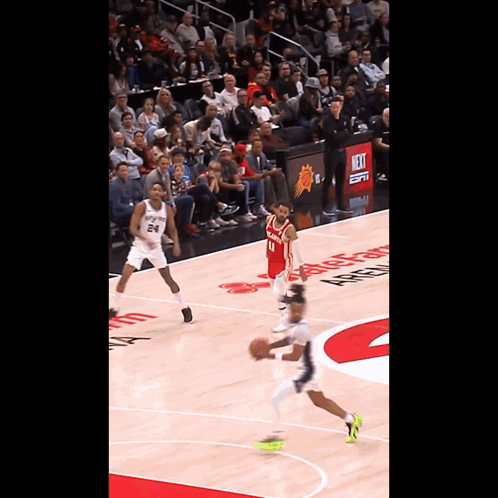 Basketball Game in Front of ESPN Sign