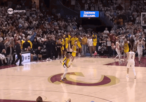 Basketball Game In Front Of Sherwin Williams Sign GIF