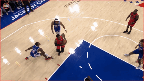 Basketball Game In Front Of Wells Fargo Banner GIF