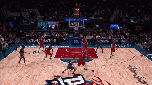 Basketball Game on Court with P Logo