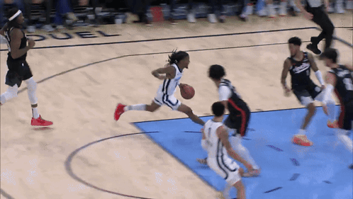 Basketball Game On Duel Court GIF