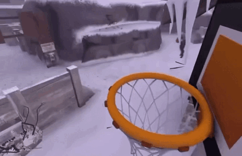 Basketball Hoop in Snow With Sign