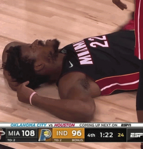 Basketball Player #22 Laying on Floor