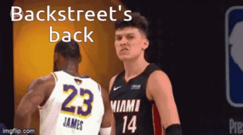 Basketball Player 23 Beside Another Player