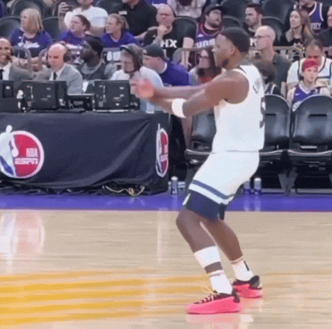 Basketball Player Dancing in Front of ESPN Logo
