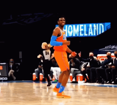 Basketball Player Dancing on Court Saying Homeland