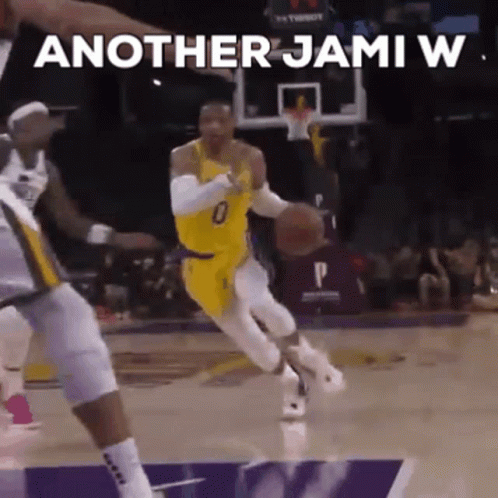 Basketball Player Dribbling Another Jami W