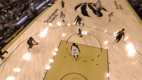 Basketball Player Dribbling Number 12