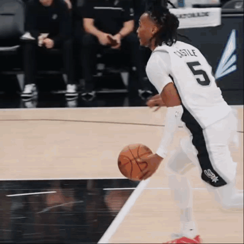 Basketball Player Dribbling Number 5