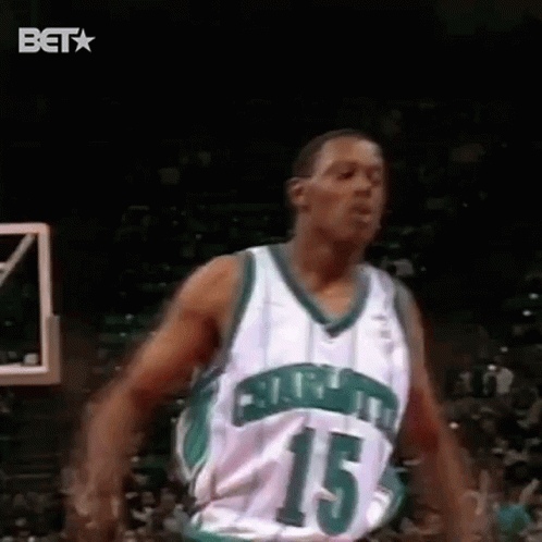 Basketball Player Green And White Number 15 Jumping GIF