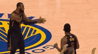 Basketball Player Hugging Another
