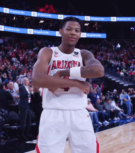 Basketball Player in Arizona Jersey Arms Crossed