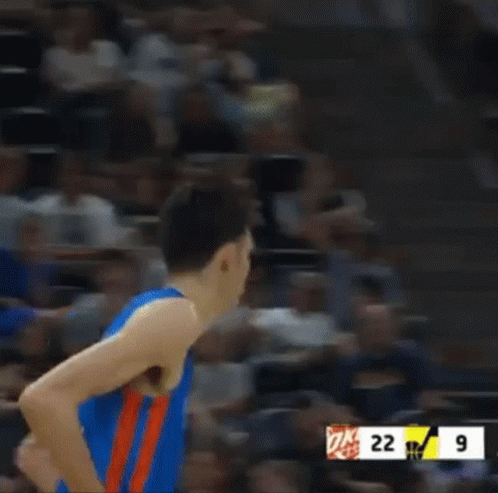 Basketball Player in Blue Jersey Number 7