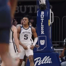 Basketball Player in Butler Jersey in Front of Pella Hoop