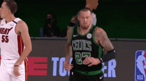 Basketball Player in Celtics Jersey Running