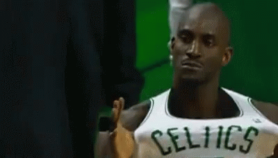 Basketball Player In Celtics Jersey Standing In Stands GIF