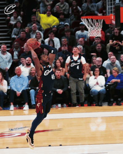 Basketball Player in Cleveland Jersey Jumps