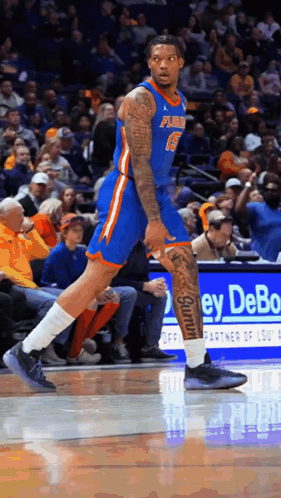 Basketball Player in Florida Jersey With Leg Tattoo